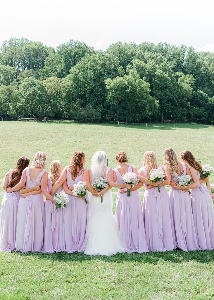 Purple bridesmaids dresses photo.