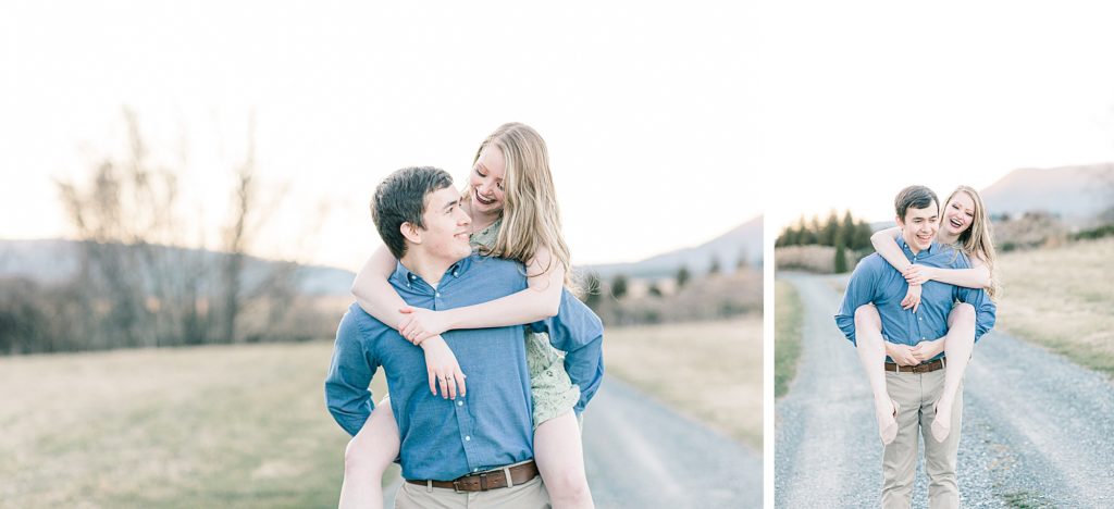 Boy giving girl a piggy-back ride across gravel road during sunset at the front of a Lexington, VA wedding venue.