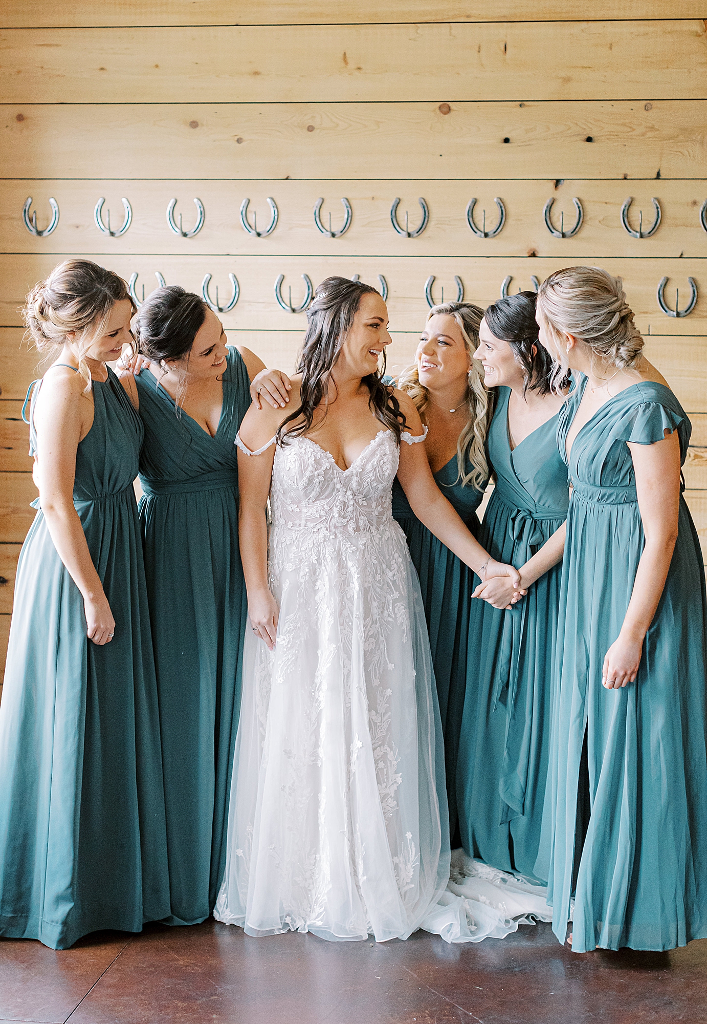 Bridesmaids wearing blue dress.