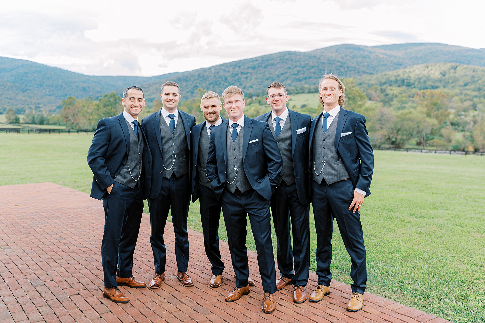 Groomsmen in blue suits at King Family Vineyards wedding.