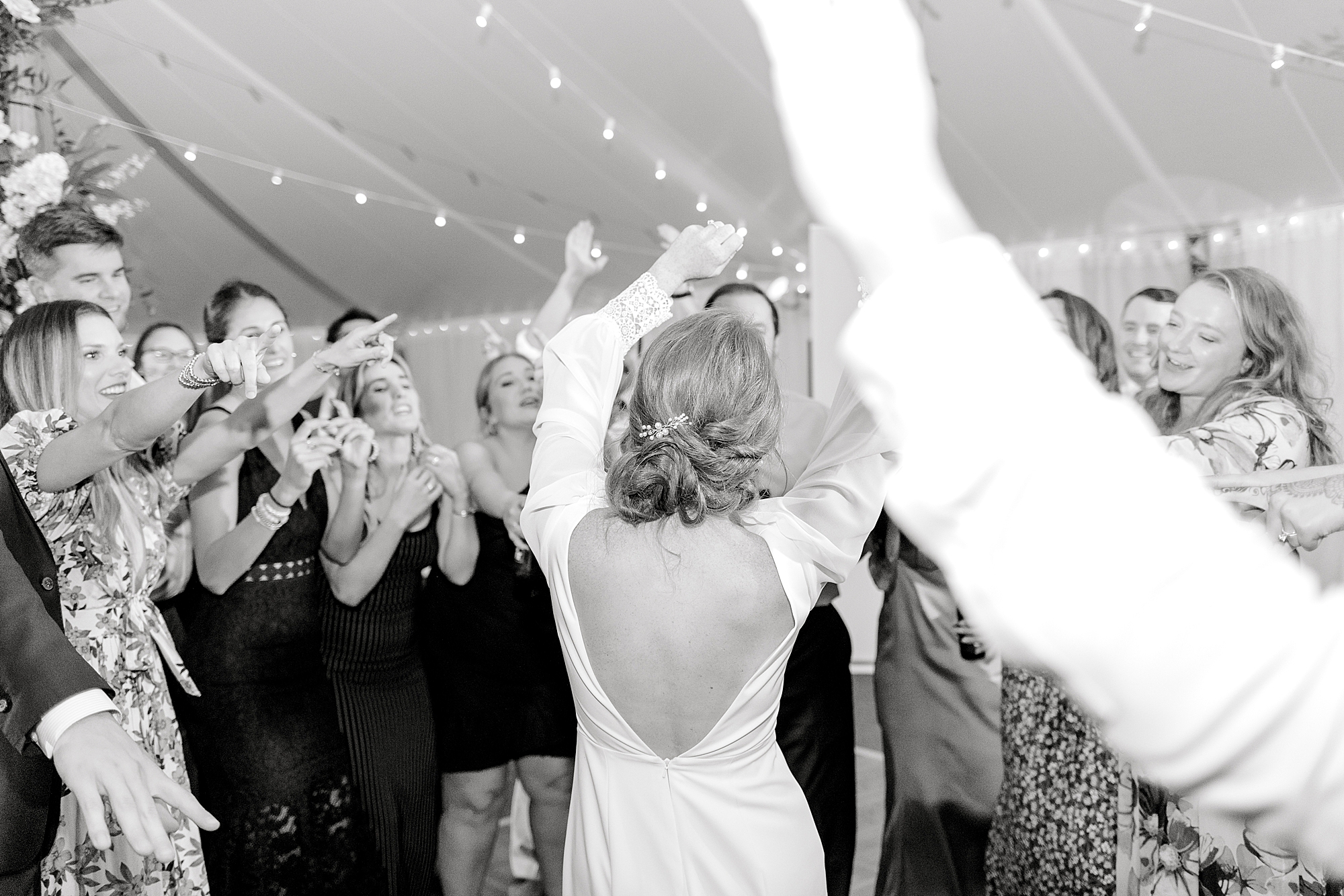Bride dancing at wedding.