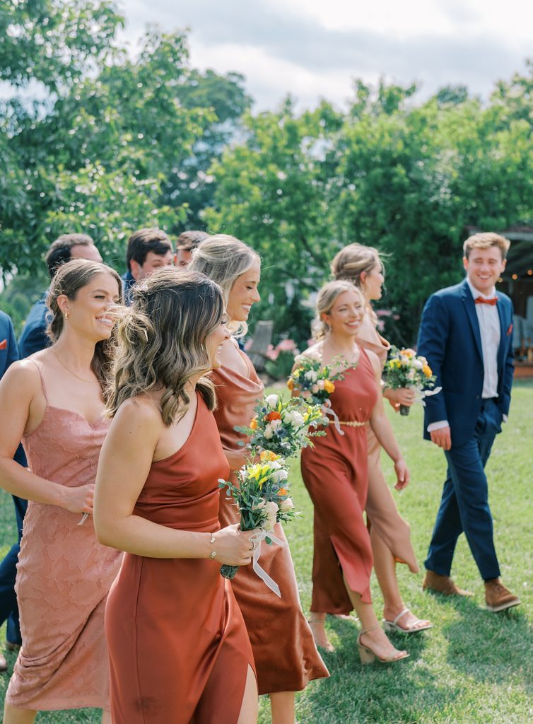 Bridesmaids wearing dresses from BHLDN.