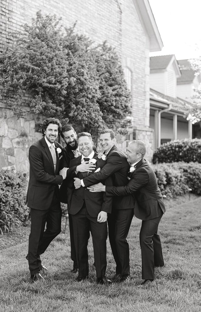 Candid photo of groomsmen.