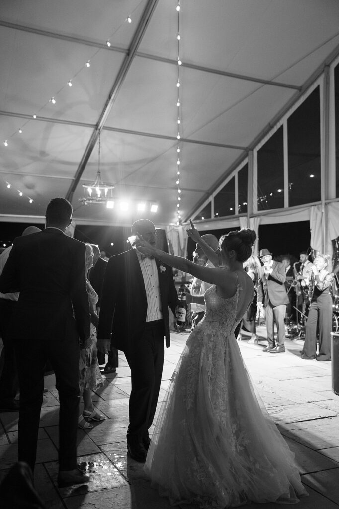 Couple dancing to band during wedding at the market at grelen.