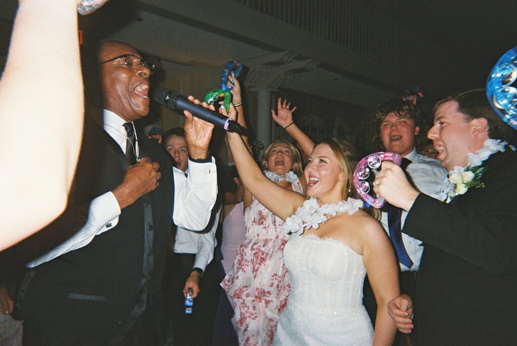 Bride and groom dancing with band at wedding in Richmond, Virginia.